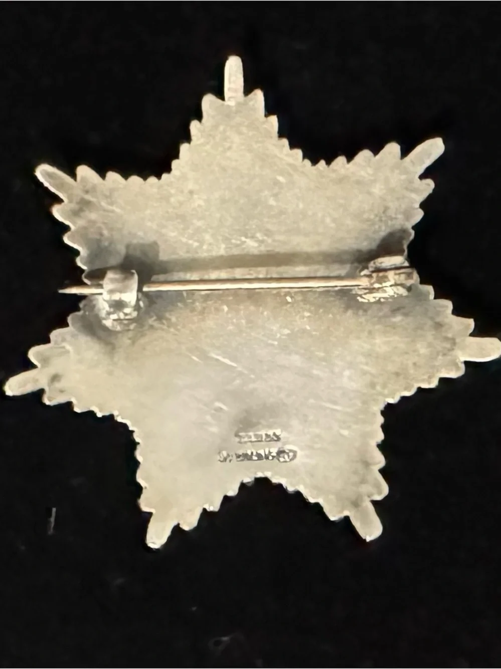 Vintage Sterling Starburst with Green & White Enamel Accents